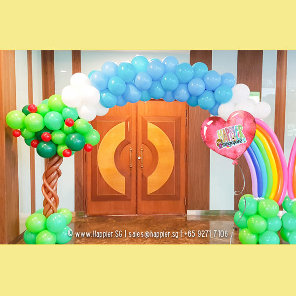 Rainbow garden balloon arch